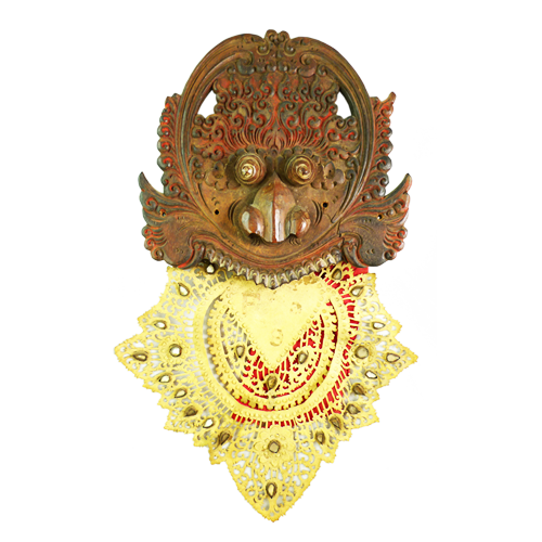 Bali face intricately carved with leather and cloth fire tongue