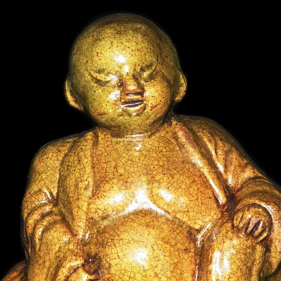 Ceramic sculpture of the Chinese Laughing Buddha (Maitreya)