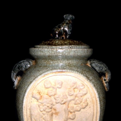 Yuan Longquan ware jar with figuative lid
