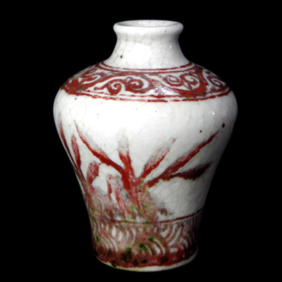 Yuan white glaze jarlet with red designs