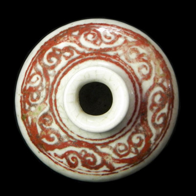 Yuan white glaze jarlet with red designs