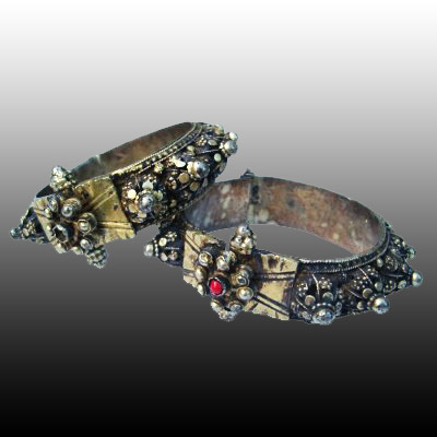 Pair of Minangkabau silver bracelets with rubies