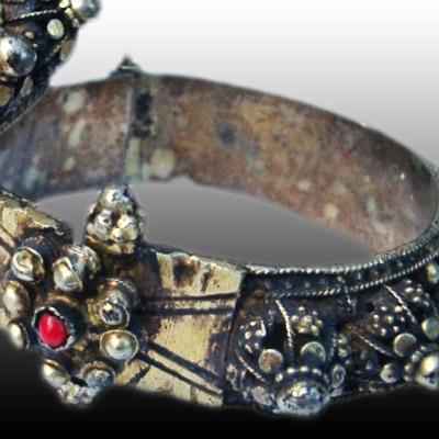 Pair of Minangkabau silver bracelets with rubies