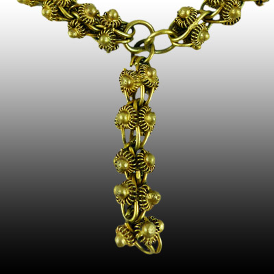 Yellow metal Minangkabau necklace with fine filigree work