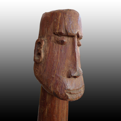 Asmat male figure carved from hardwood in the form of an erect penis