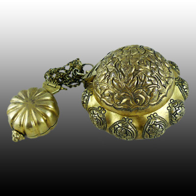 Ornately decorated Minangkabau 10 karat gold betel nut and lime container set