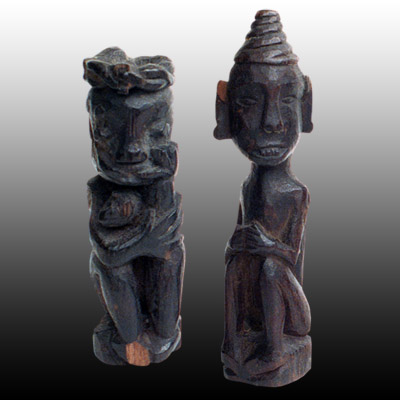 Two Dayak wooden charms