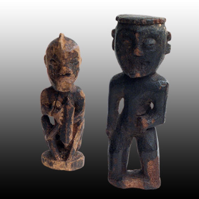 Two Dayak wooden charms