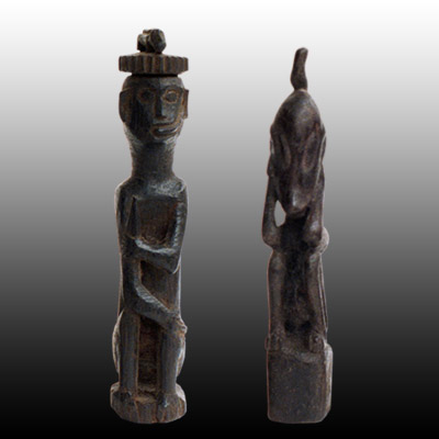 Two Dayak wooden charms