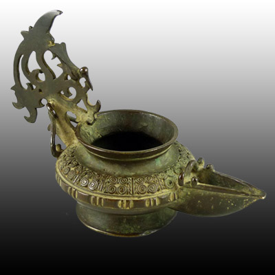 Highly decorative Toraja oil lamp