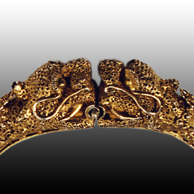 Gold Minangkabau braclet in the form of two 