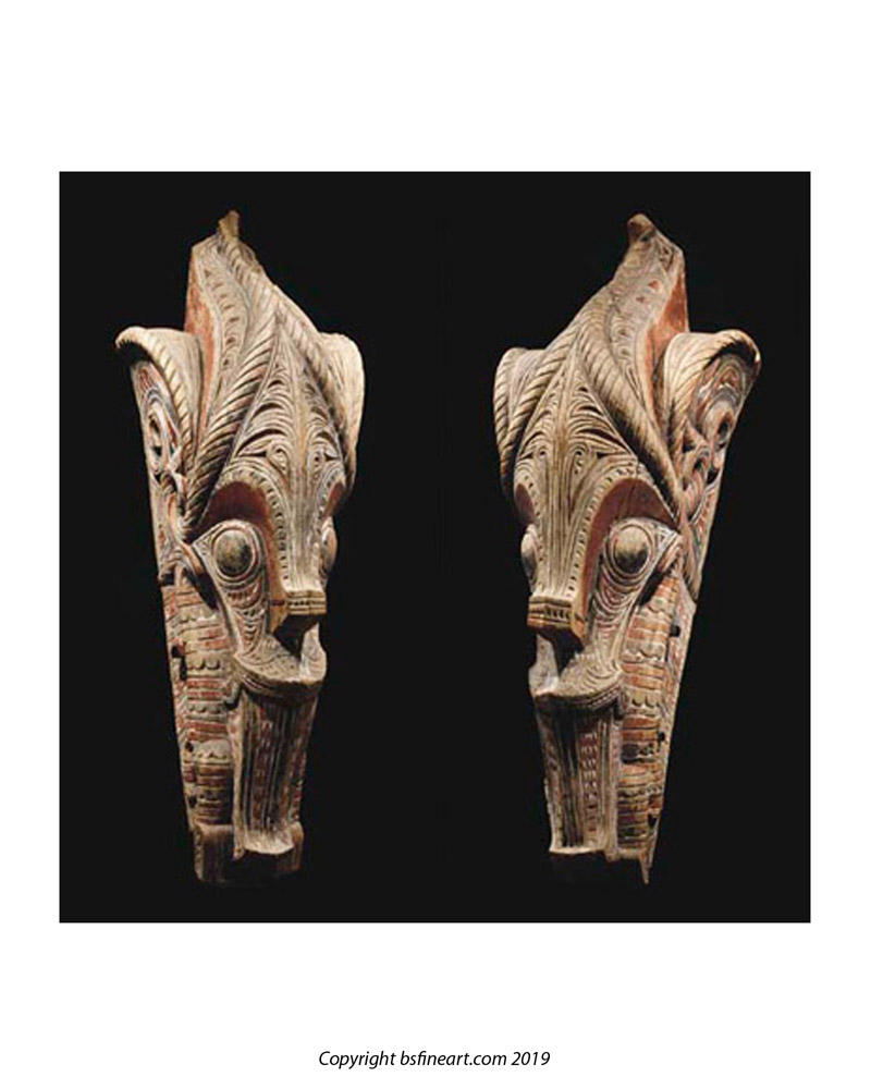 Large pair of Singa-Singa heads taken from a Batak Toba house gable