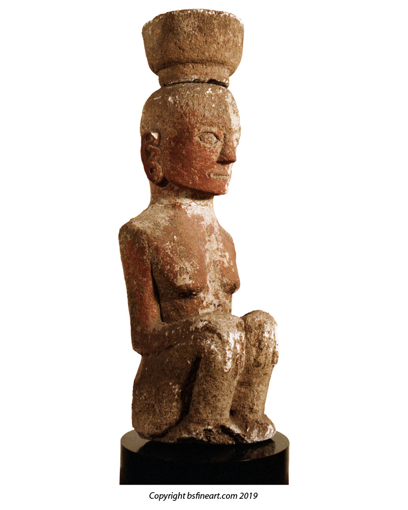 Batak Toba stone femal figure in seated position