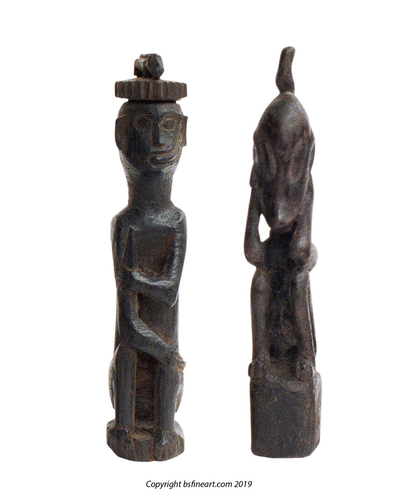 Two Dayak wooden charms