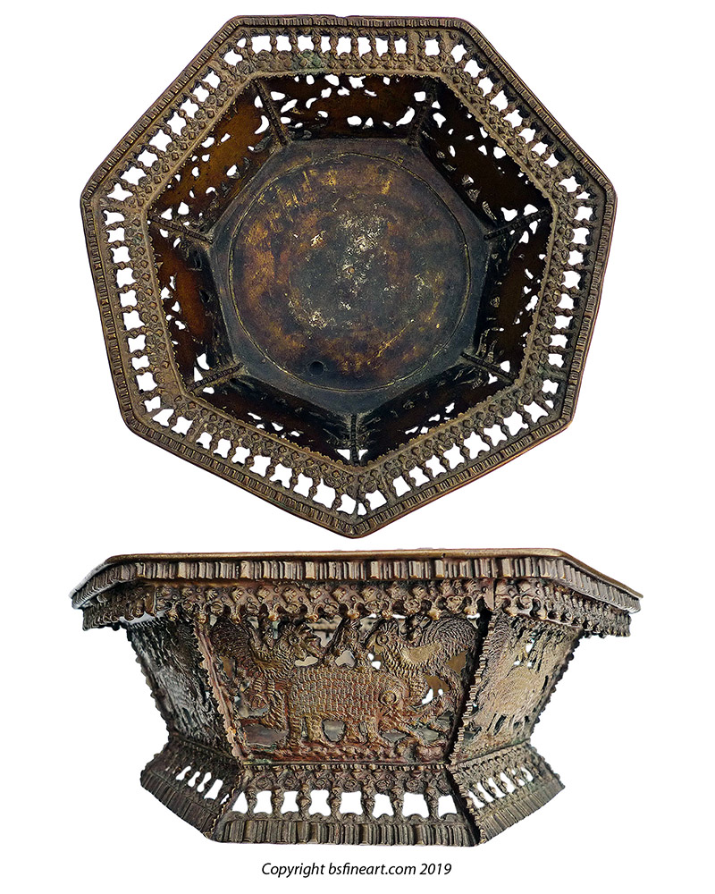 Minangkabau bronze bowl cast and adorned with elephants, hens and clove spice kernals