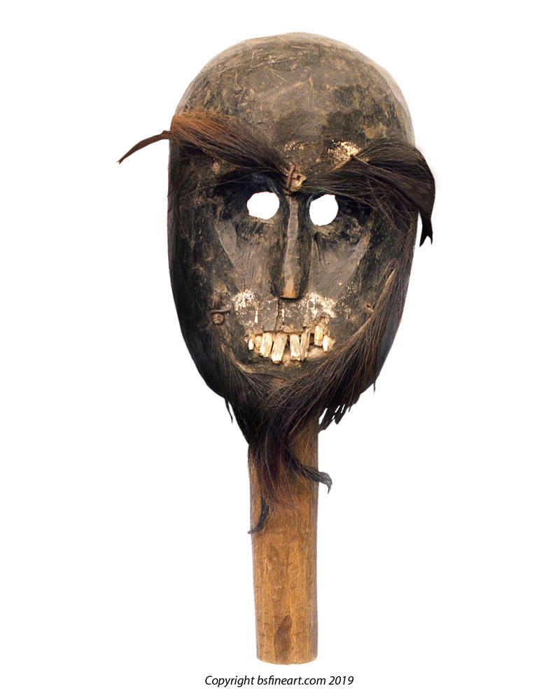 Horific Timor mask with hair and human teeth