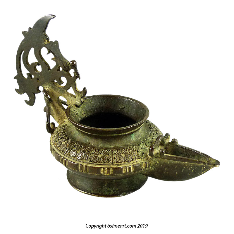 Highly decorative Toraja oil lamp