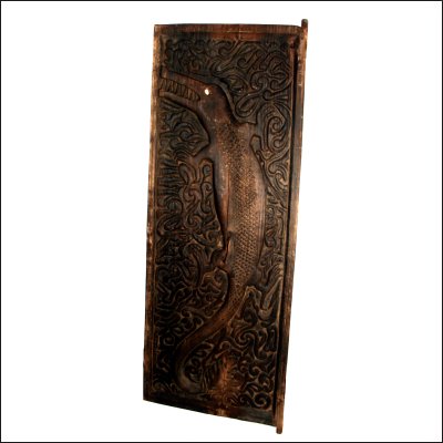 West Kalimantan Dayak Longhouse door finely carved with a crocodile