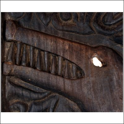 West Kalimantan Dayak Longhouse door finely carved with a crocodile