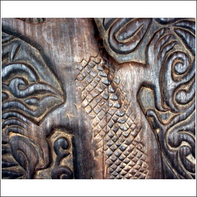 West Kalimantan Dayak Longhouse door finely carved with a crocodile