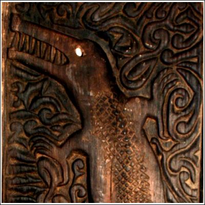 West Kalimantan Dayak Longhouse door finely carved with a crocodile